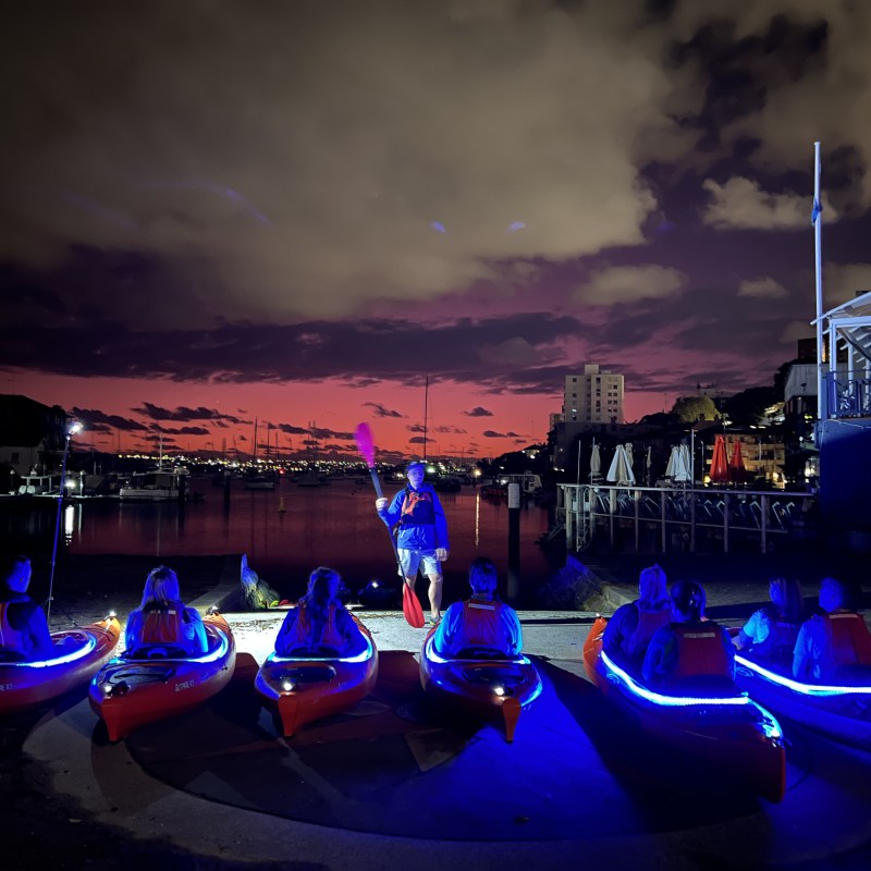 a group of people in a dark room