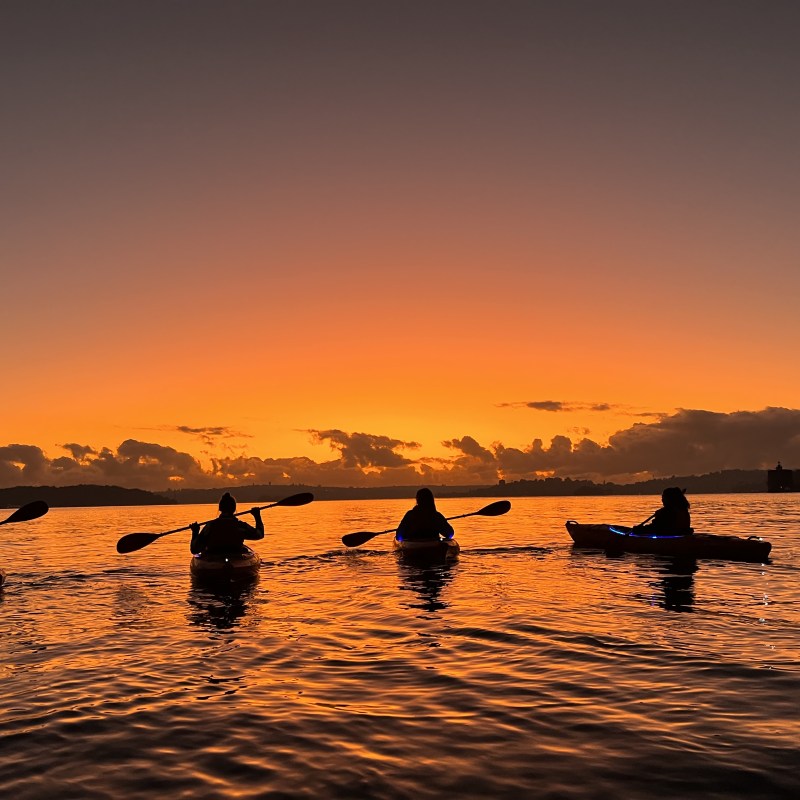 a sunset over a body of water