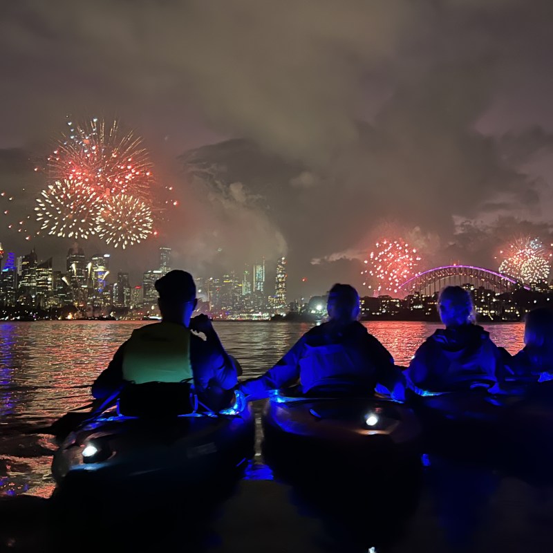 a group of people in a dark room