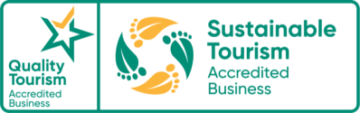 Quality and Sustainable Tourism Accredited Business logos side by side.