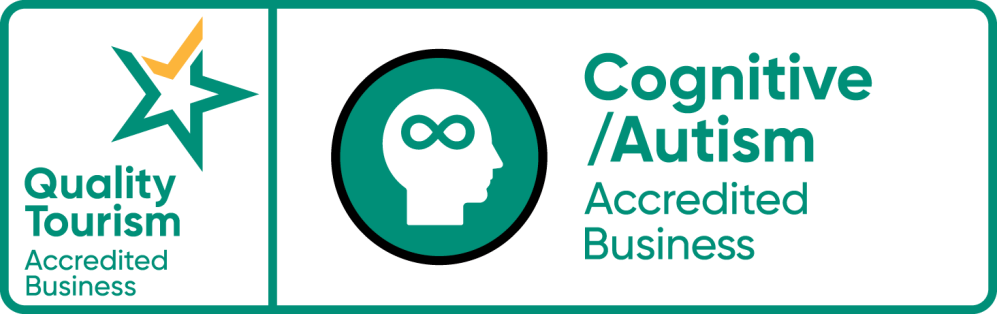 Logos for Quality Tourism and Cognitive/Autism Accredited Business with icons and text.